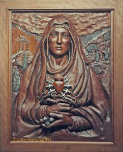 "La Madre Dolorosa" (Sorrowful Mother) wood sculpture (high relief) by AVonnHartung for Casa de Niños Manuel Fernandez Juncos (Miramar SJ, Puerto Rico